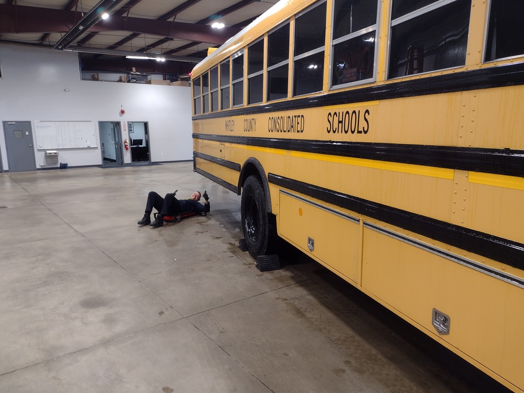 Police inspects WCCS bus and gives a "thumbs up"